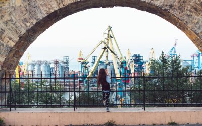 little-girl-playing-at-fence